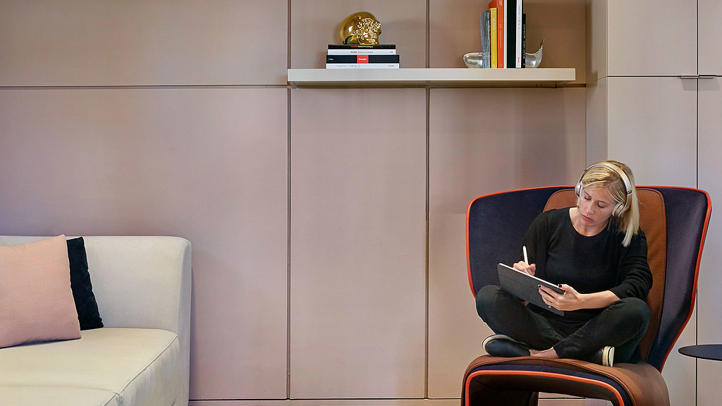 A person sitting in a chair.