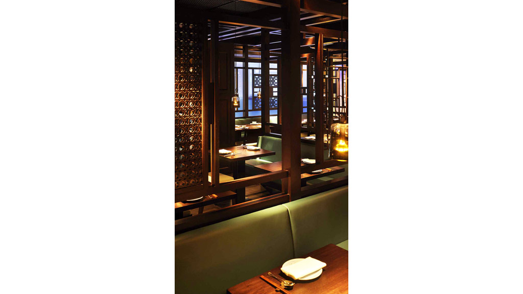 A room with a table and chairs.