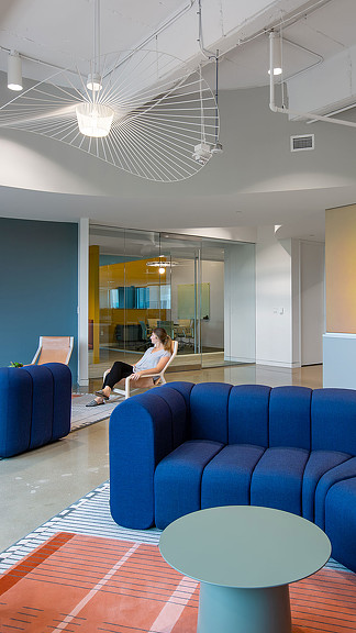 A person sitting on a couch.