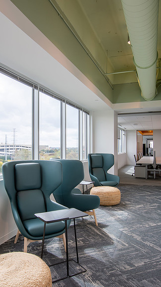 A room with chairs and a table.