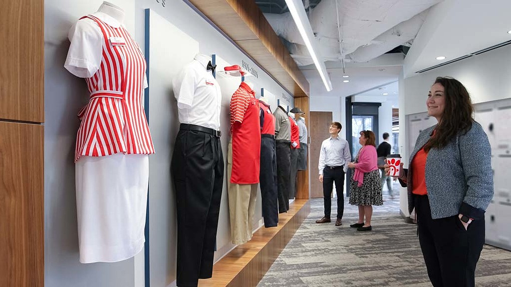 A group of people in a room.