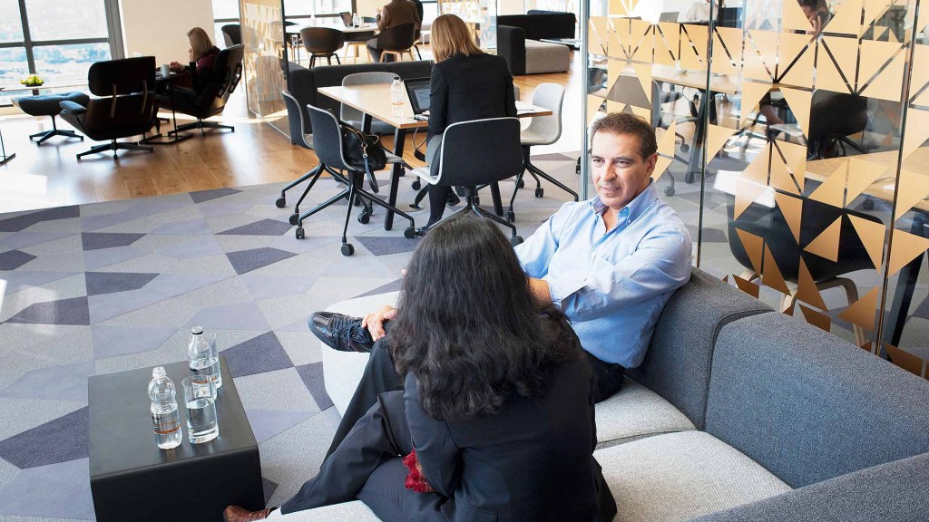 A group of people sitting in a room.