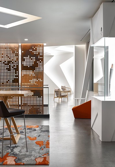 A room with shelves of wine.