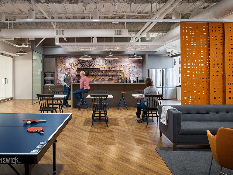 A group of people in a room.