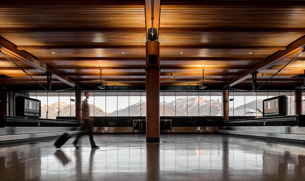A person walking in a large room.
