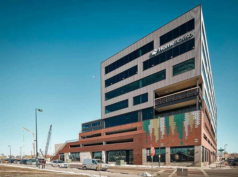 A large building with a sign on it.
