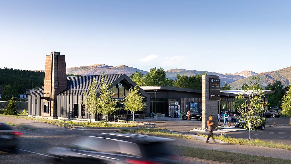 A building with a parking lot.