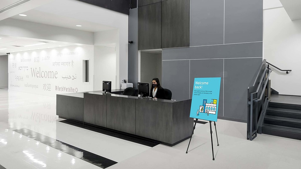 A person sitting at a desk.