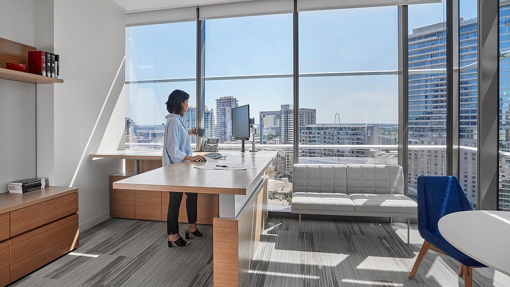 A person working on the laptop.