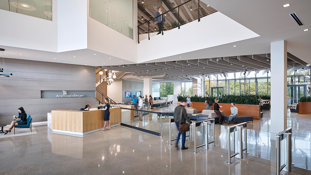 A group of people in a large building.