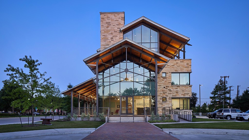 A building with a glass front.