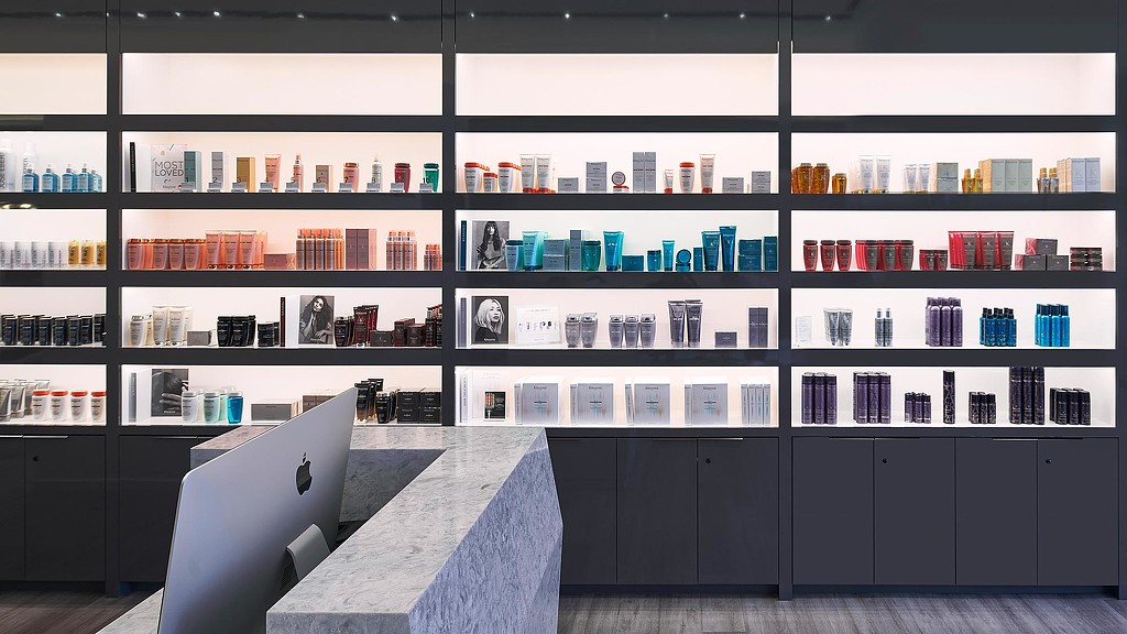 A computer on a desk.