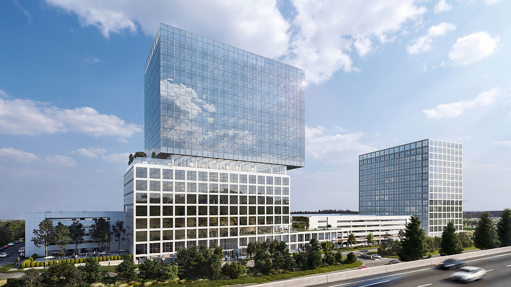 A large building with a glass front.