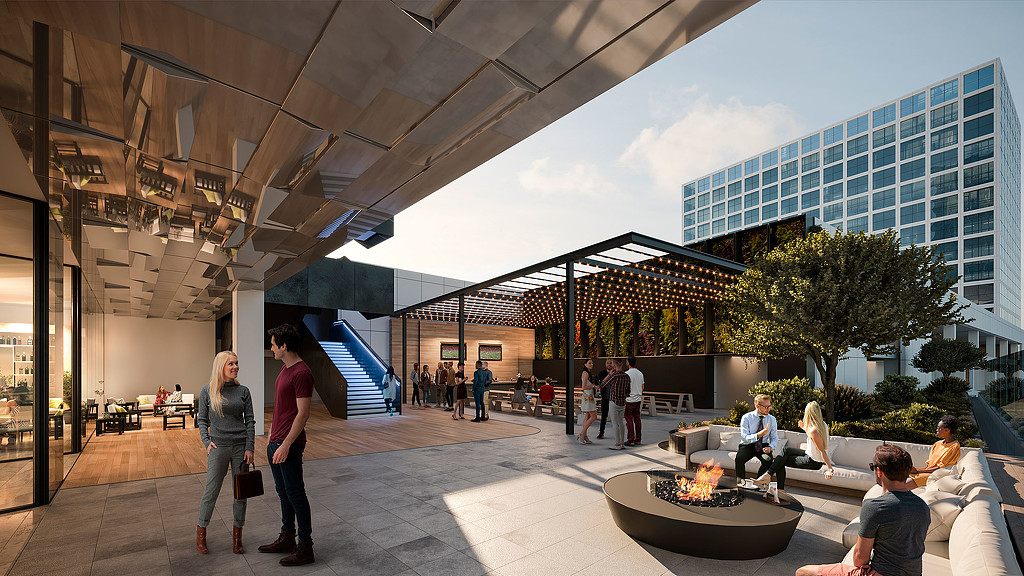 People walking around a building.