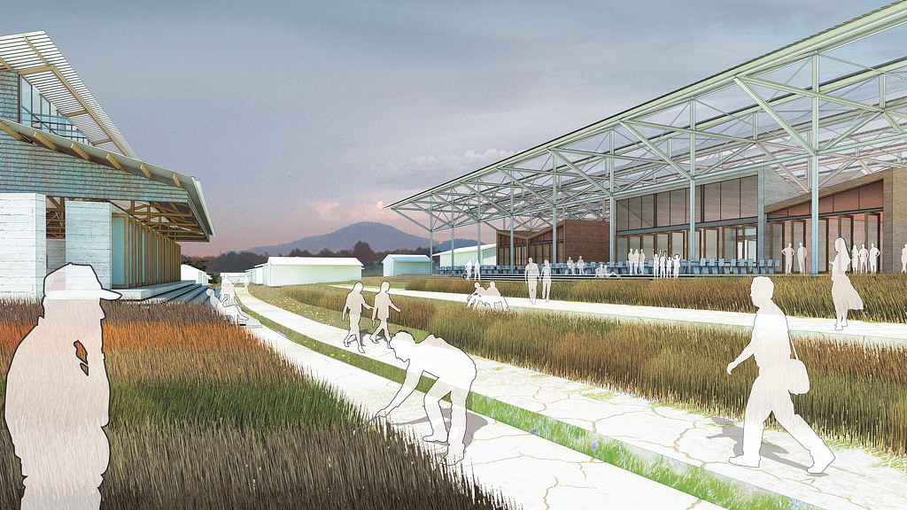 A group of people walking outside a building.