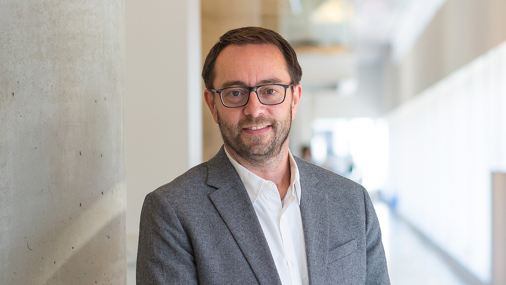 A man wearing glasses.