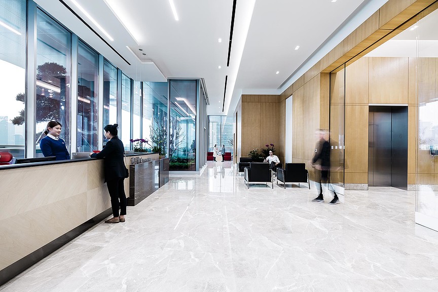 A group of people in an office.