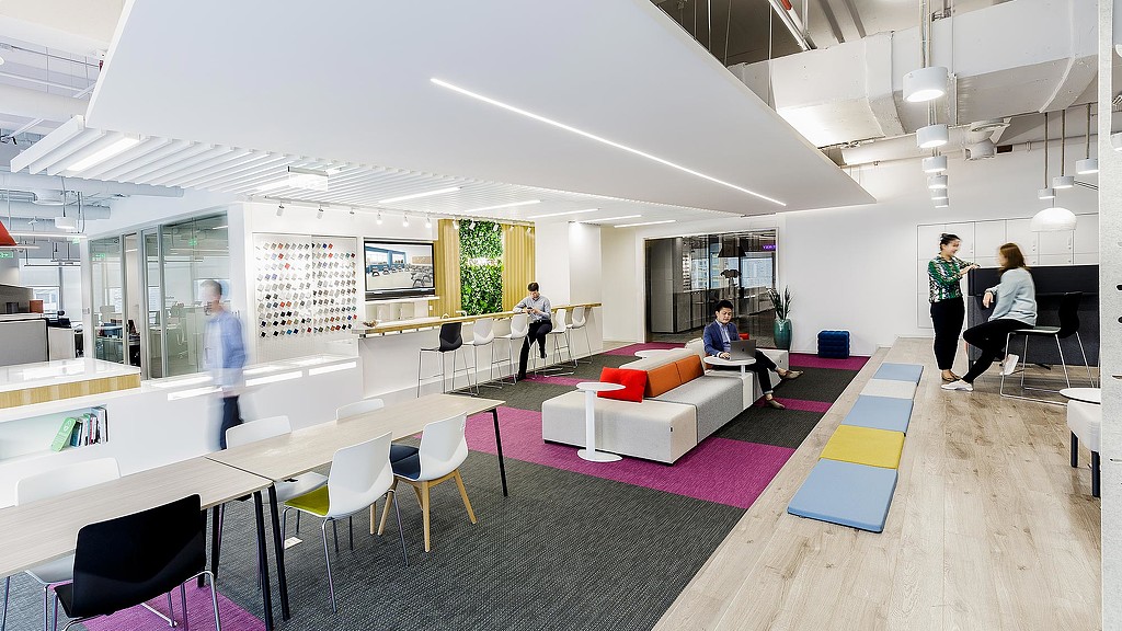 A group of people in a room.