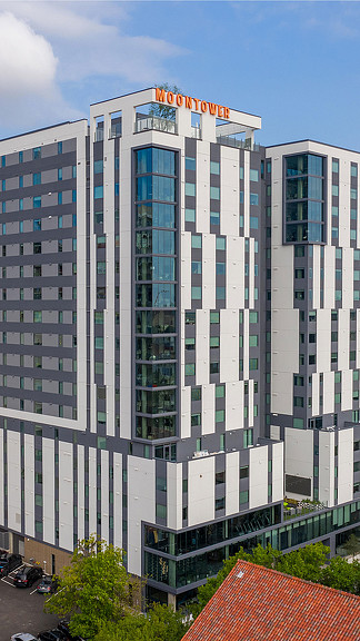 A tall building with a sign on it.