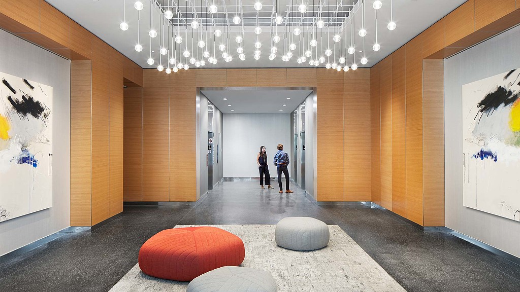 A group of people in a room.