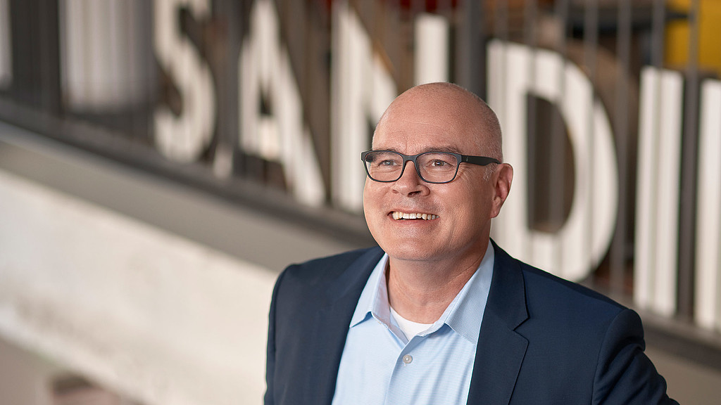 A man wearing glasses.