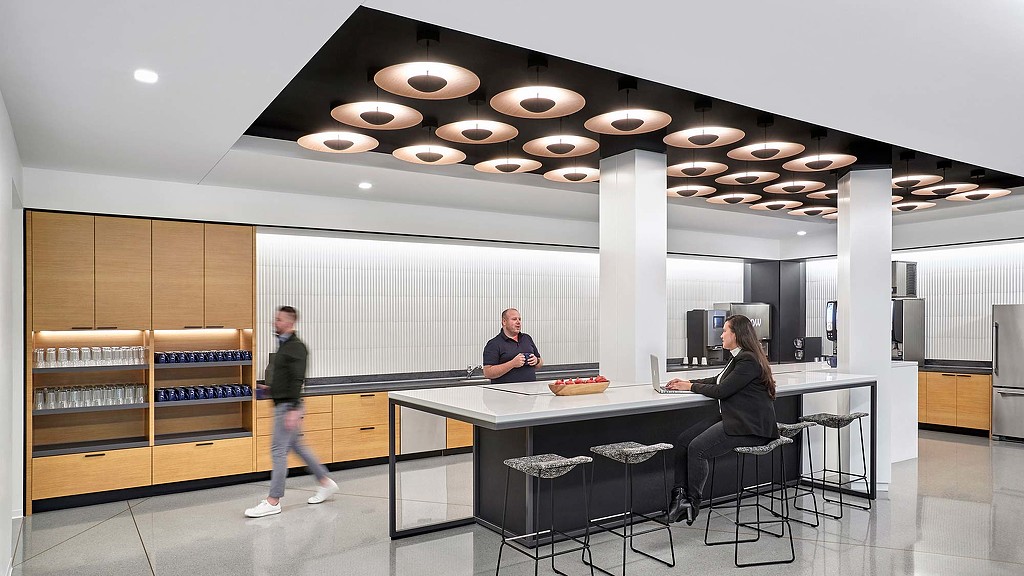 A few people in an office.