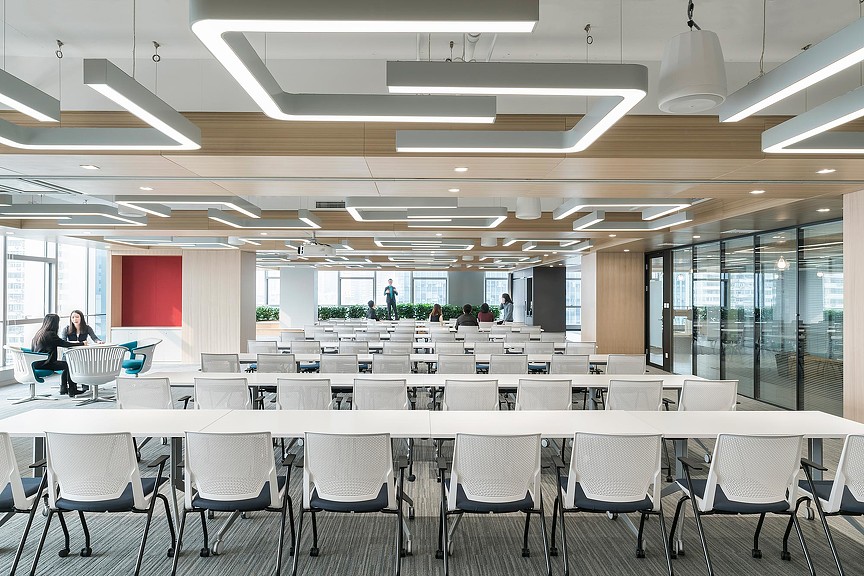 A room with tables and chairs.