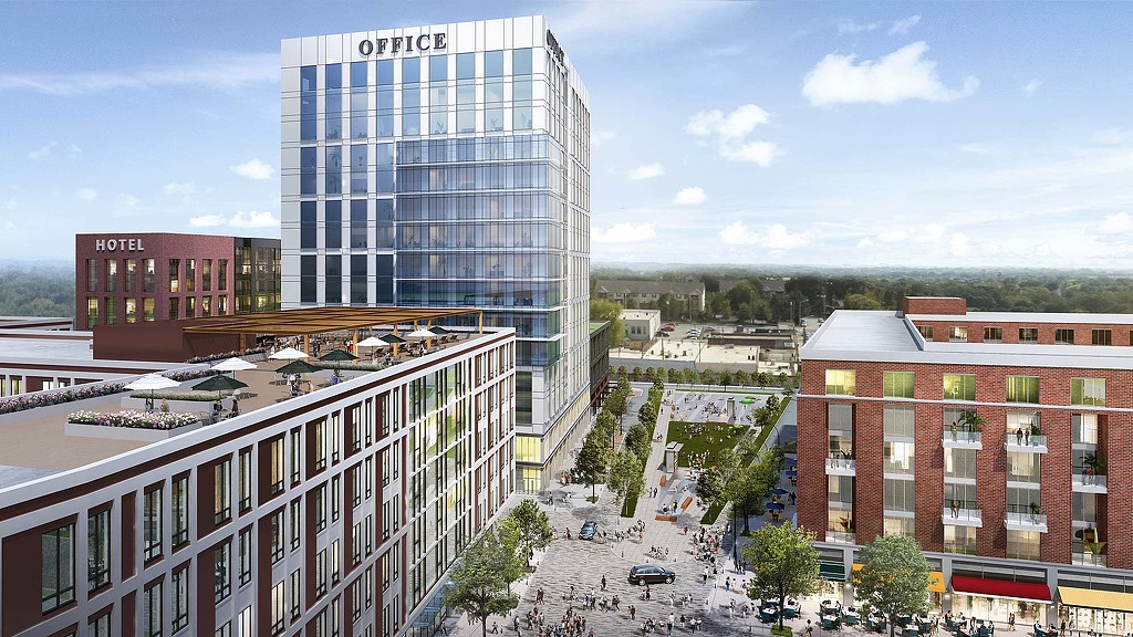 A large building with a parking lot.