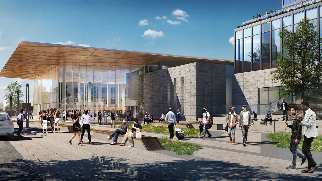 A group of people outside a building.