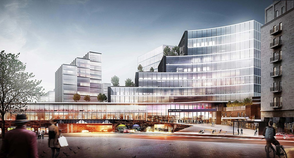 A large building with a bridge over it.