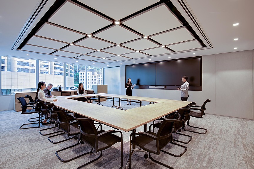 A group of people in a room.