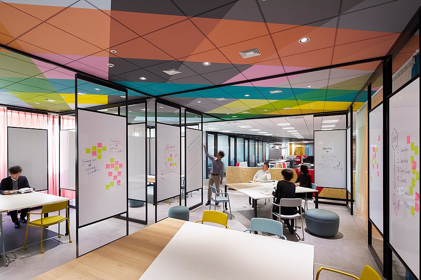 A group of people in a room.