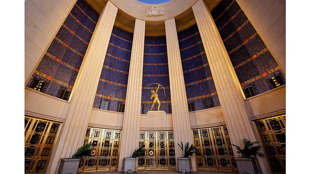 A building with a large glass window.