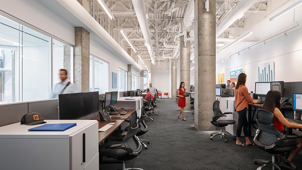 A group of people in an office.