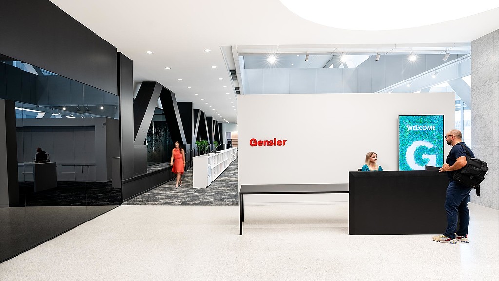 A man and a woman in a building.