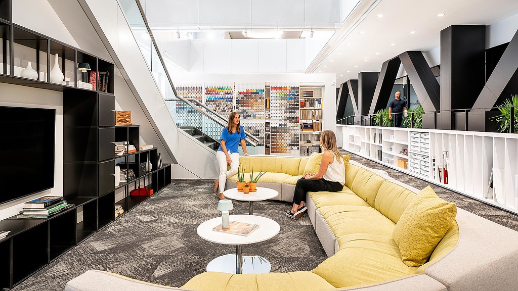 A person sitting on a couch.