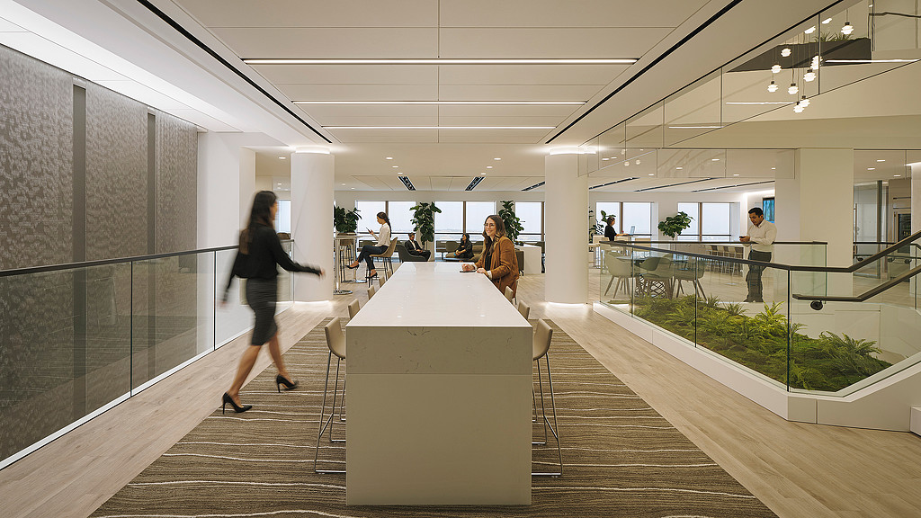 A person walking in a large building.