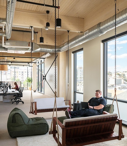 A person sitting on a couch.