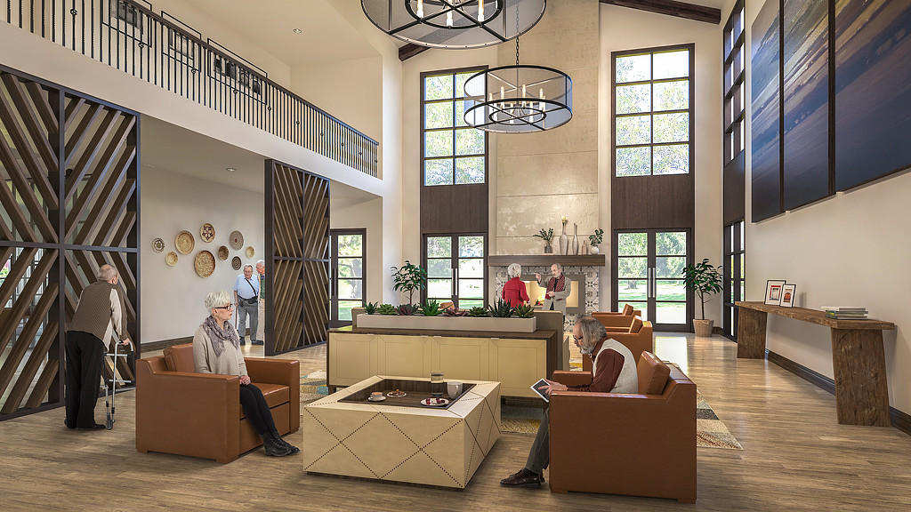 A large room with a staircase and people in it.