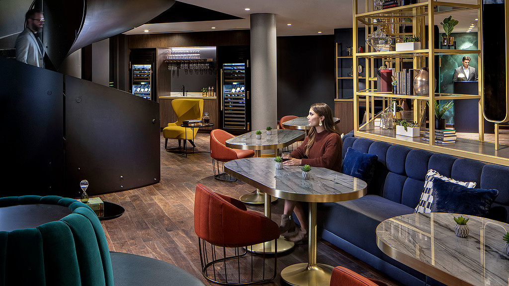 A person sitting at a table.