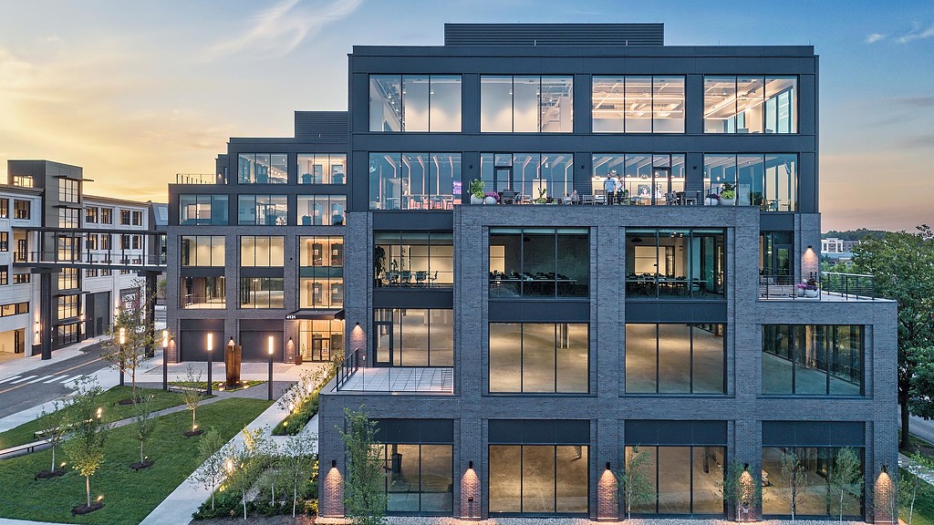 A modern building with glass windows.