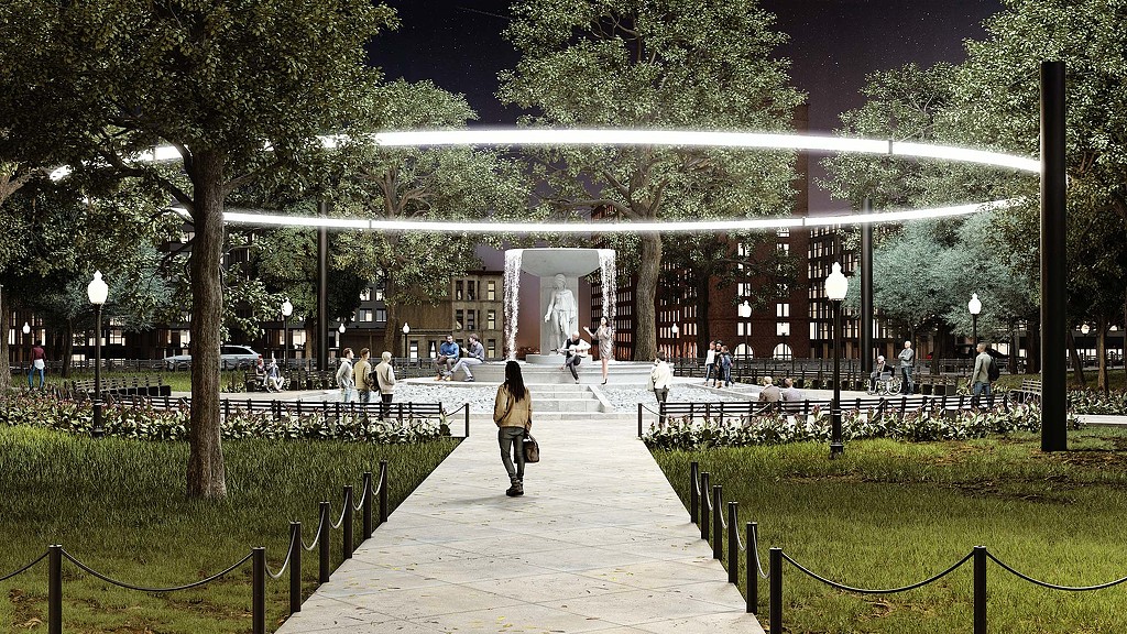 A person walking on a path in a park.