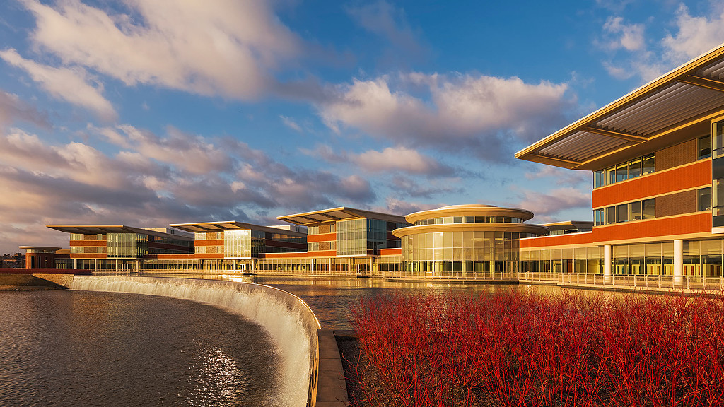 A body of water with buildings along it.