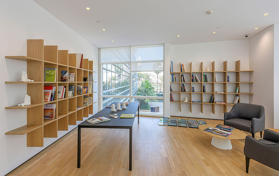 A room with a table and chairs.