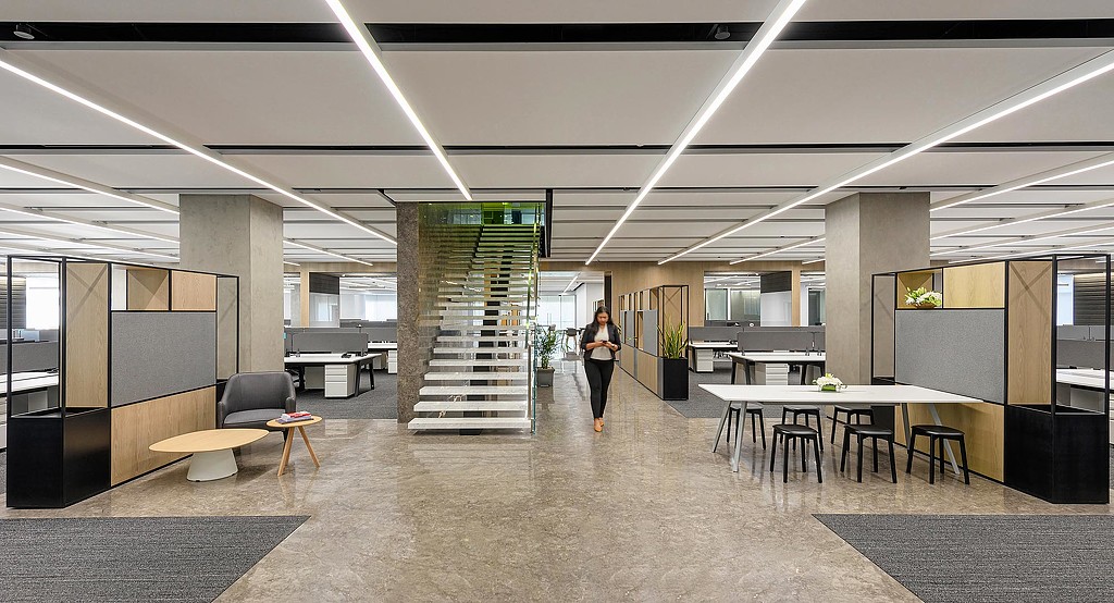 A person walking in a large room.