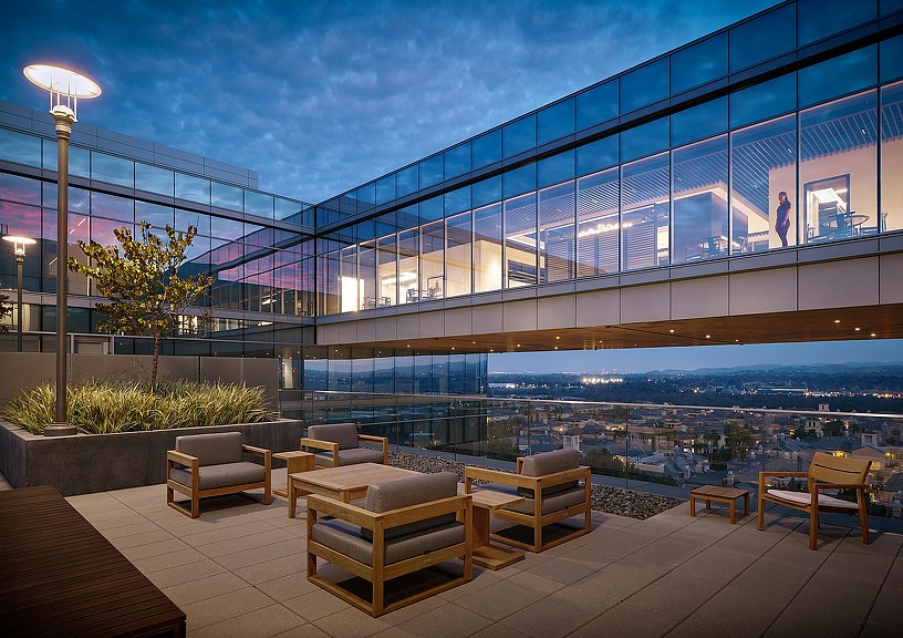 A building with a large glass wall.