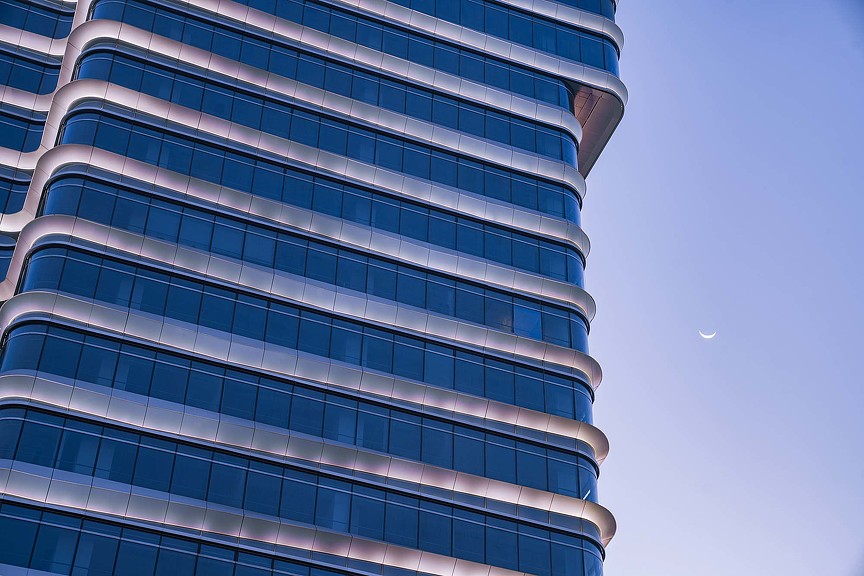 A tall building with many windows.