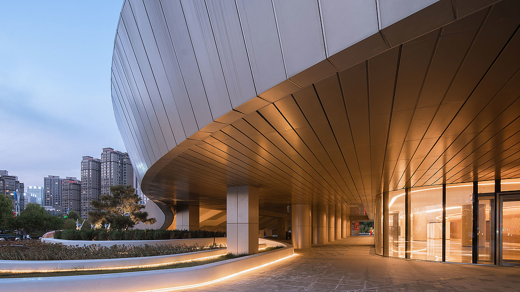 A building with a curved roof.