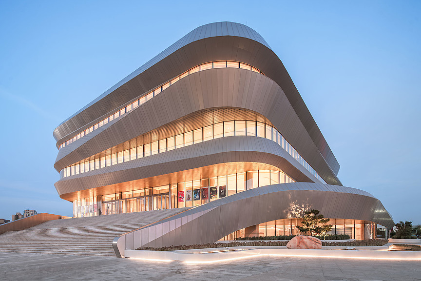 Mercedes-Benz Museum with a curved roof.