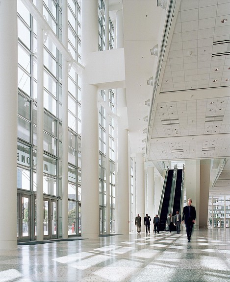 People walking in a large building.